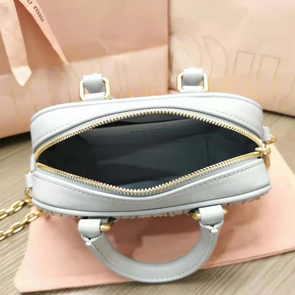 Miu Miu Matelassé Nappa Leather Top-Handle Mini-Bag for Women in Silver