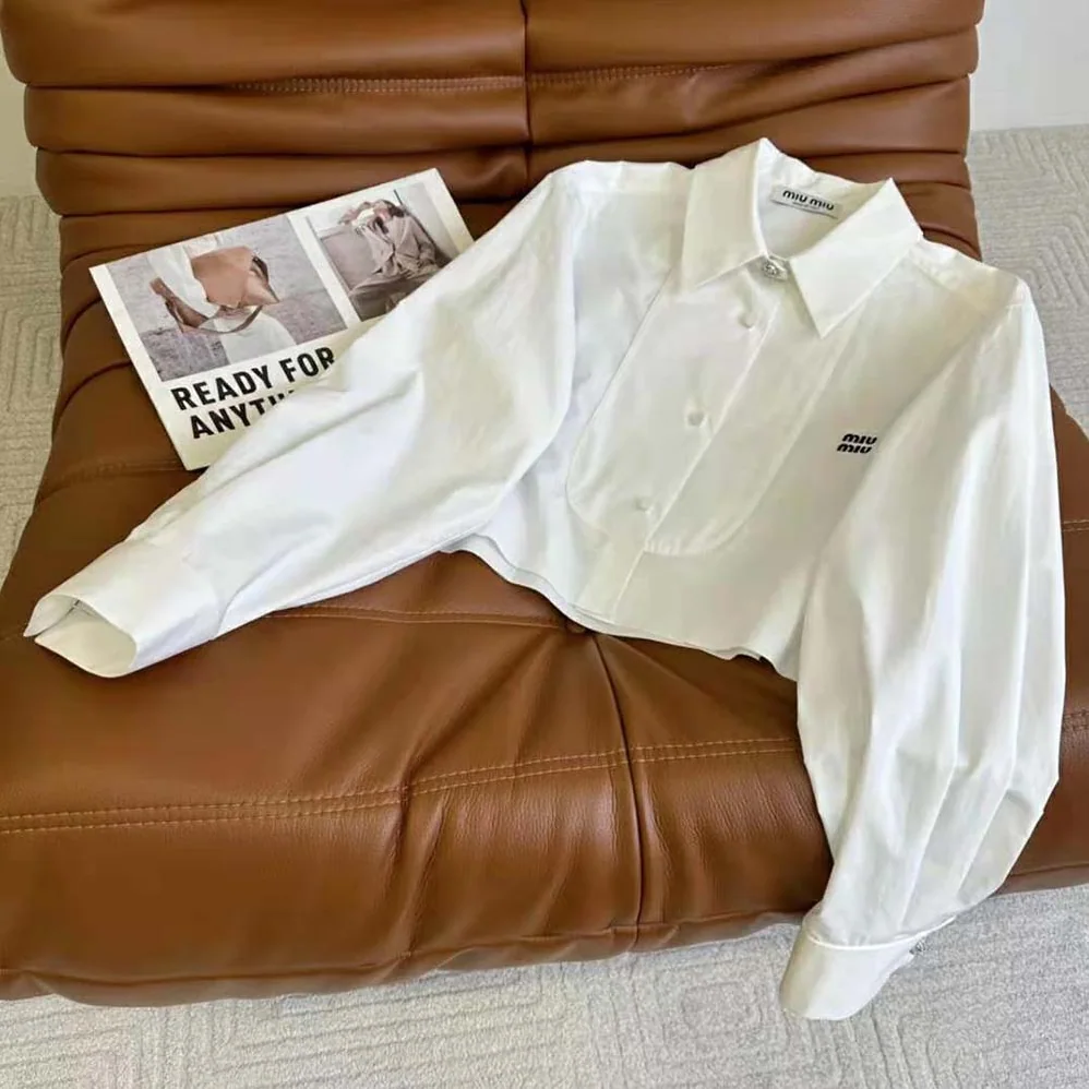 Miu Miu Poplin Shirt with Yarn-Embroidered Logo for Women in White Miu Miu Poplin Shirt with Yarn-Embroidered Logo for Women in White