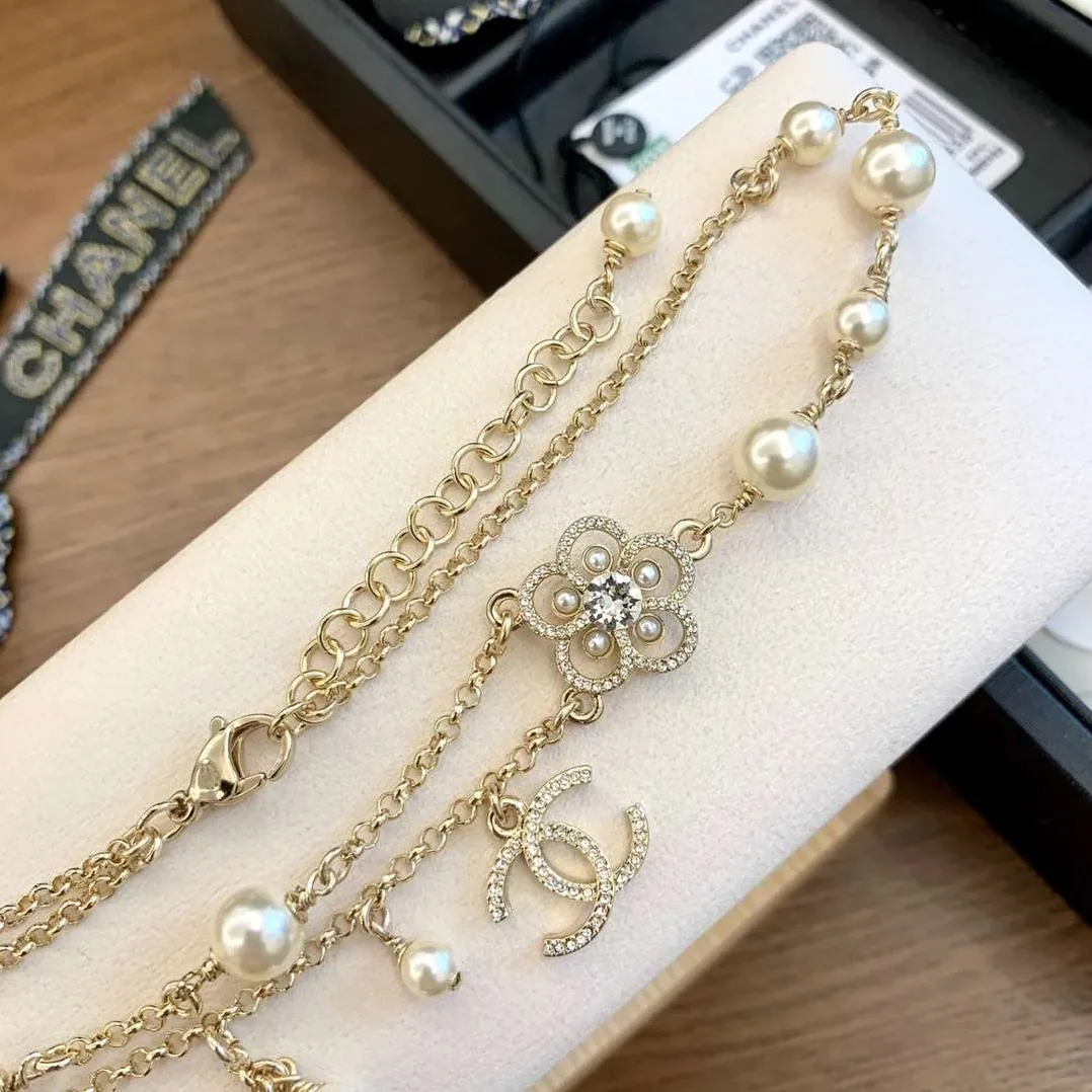 Chanel Camellia Pearl Necklace Gold