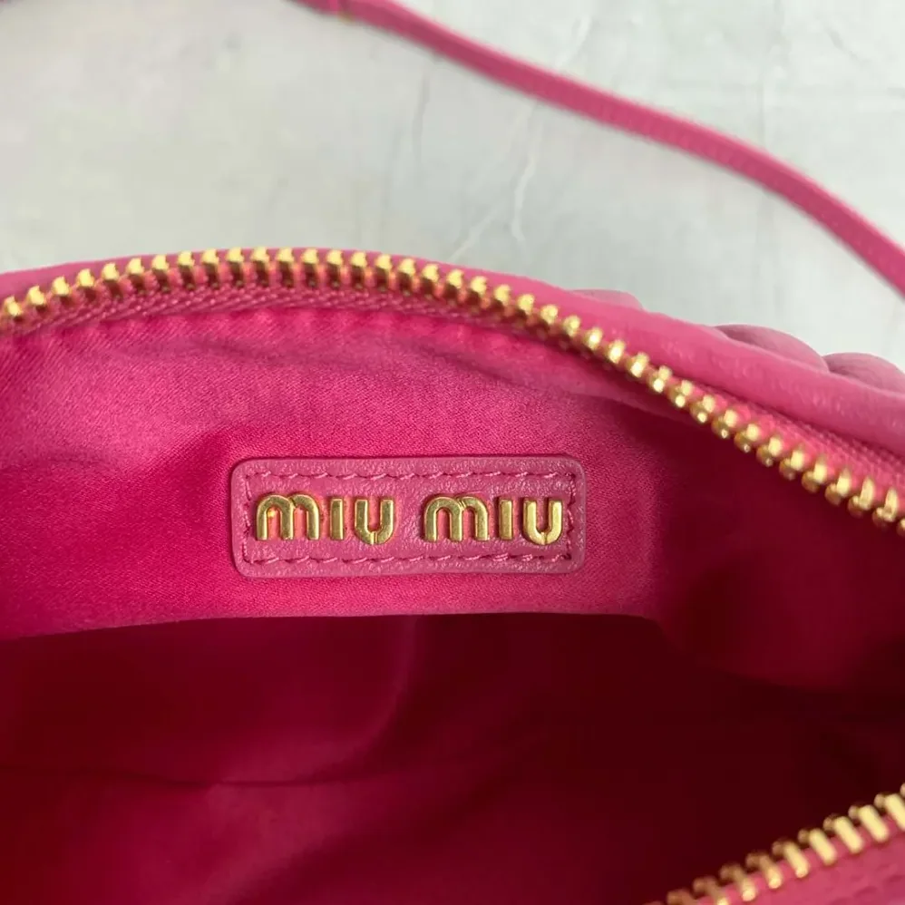 Miu Miu Wander Matelassé Nappa Leather Bag for Women in Pink/White Miu Miu Wander Matelassé Nappa Leather Bag for Women in Pink/White