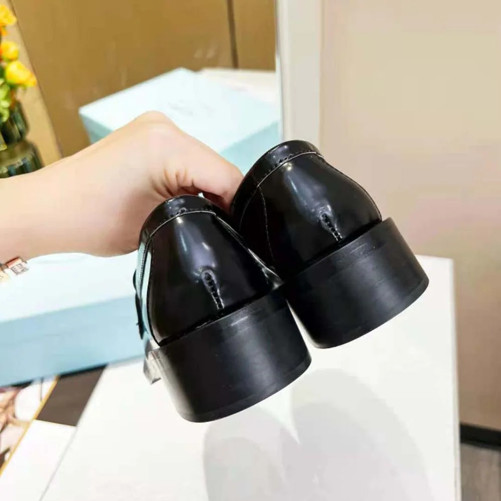 Prada Brushed Leather Loafers for Women in Black