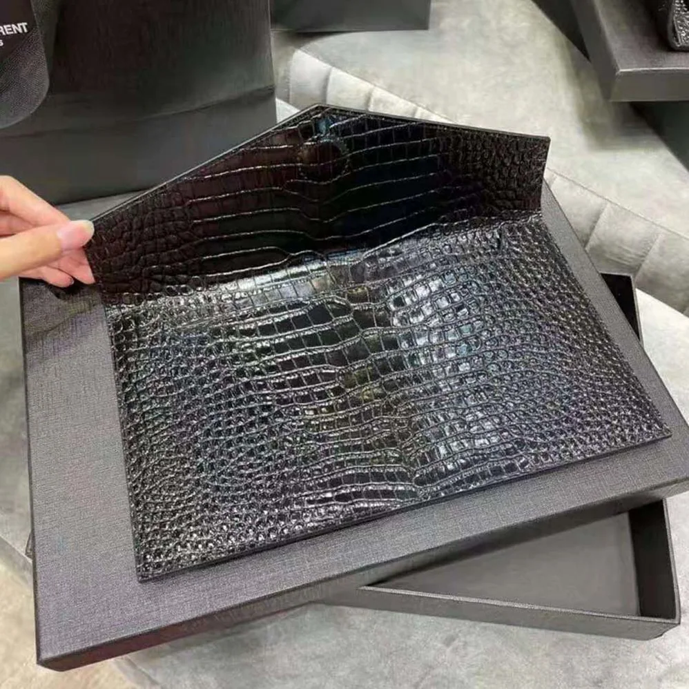 Saint Laurent YSL Uptown Pouch in Crocodile Embossed Shiny Leather for Women in Black