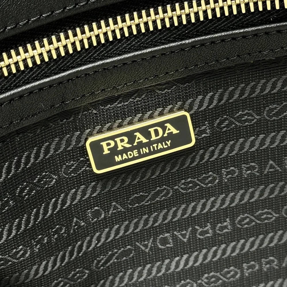 Prada Large Re-Nylon and Leather Top for Women in handle Bag with Padlock Prada Large Re-Nylon and Leather Top for Women in handle Bag with Padlock