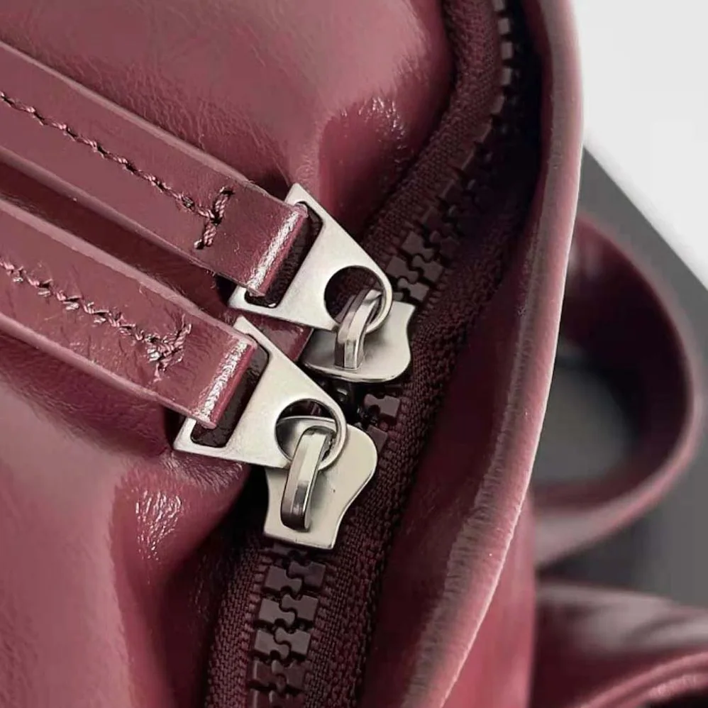 Bottega Veneta Medium Archetype Backpack Crafted from Supple Lambskin Leather for Men in Maroon