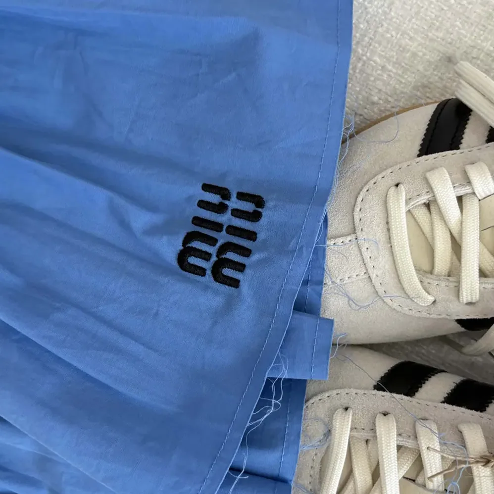 Miu Miu Poplin and Jersey Miniskirt for Women in Blue Miu Miu Poplin and Jersey Miniskirt for Women in Blue