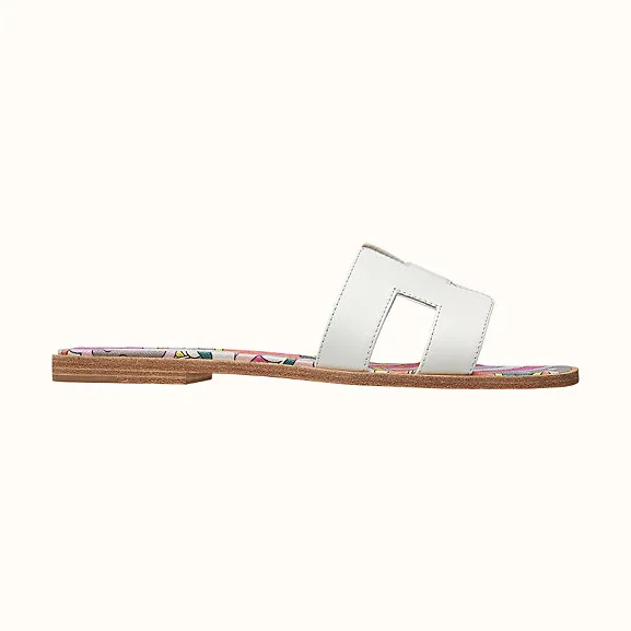 Hermes Oran Sandal in Cotton Canvas with “Faubourg Rainbow” Print for Women in White Hermes Oran Sandal in Cotton Canvas with “Faubourg Rainbow” Print for Women in White