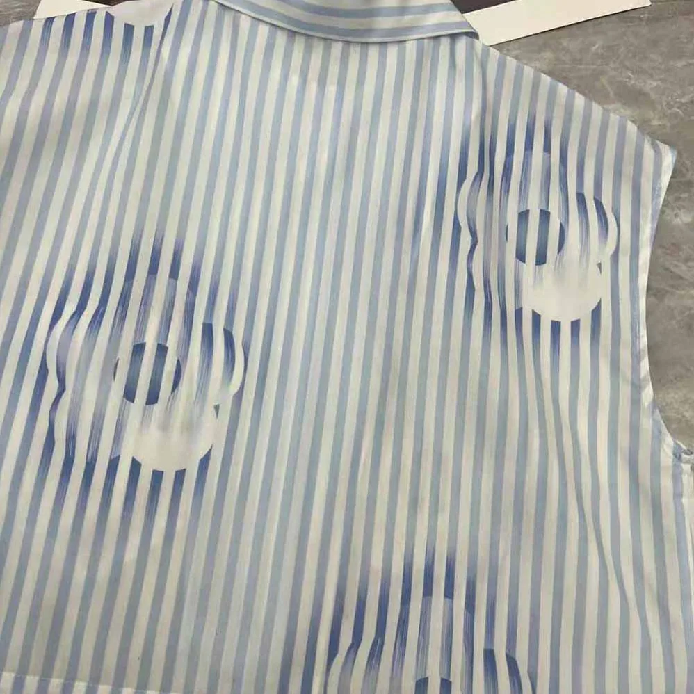Prada Sleeveless Printed Poplin Shirt for Women in Blue Prada Sleeveless Printed Poplin Shirt for Women in Blue