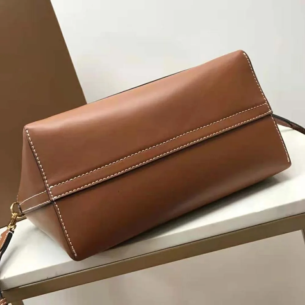 Burberry Mini Leather Soft Pocket Tote for Women in Brown Burberry Mini Leather Soft Pocket Tote for Women in Brown