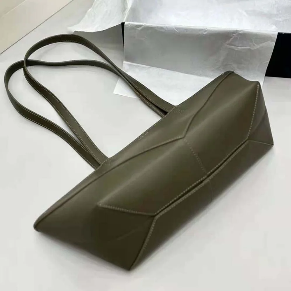 Loewe Cropped Puzzle Fold Bag in Shiny Calfskin for Women in Green Loewe Cropped Puzzle Fold Bag in Shiny Calfskin for Women in Green