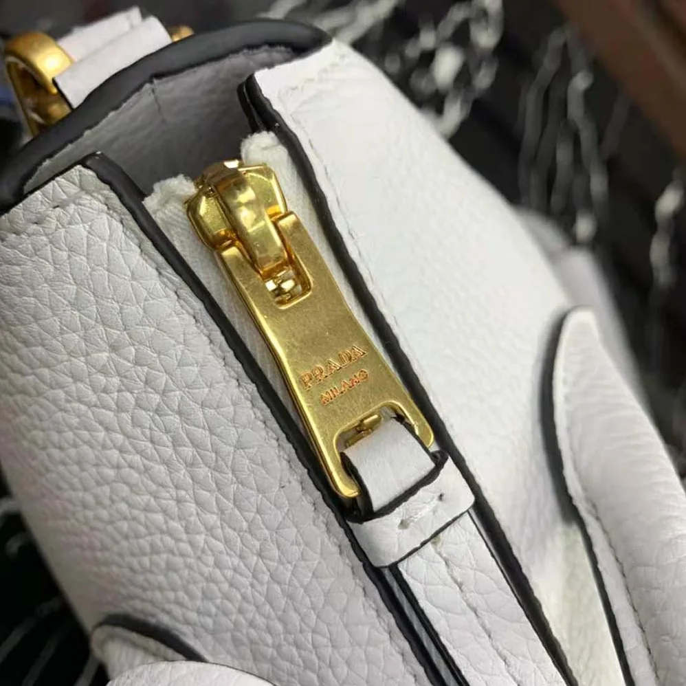 Prada Leather Handbag with Metal lettering Logo on the Front for Women in White