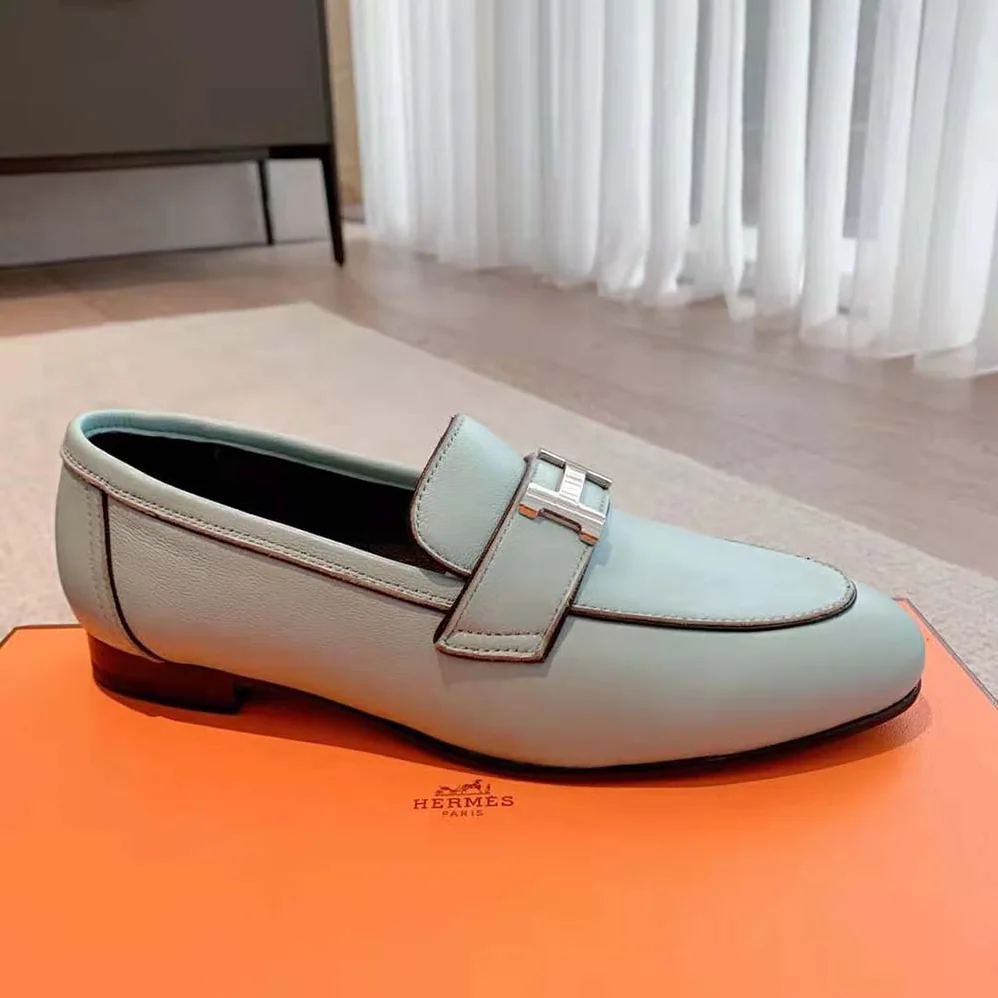 Hermes Paris Loafer in Calfskin with Palladium Plated Signature “H” Detail for Women in Blue Hermes Paris Loafer in Calfskin with Palladium Plated Signature “H” Detail for Women in Blue