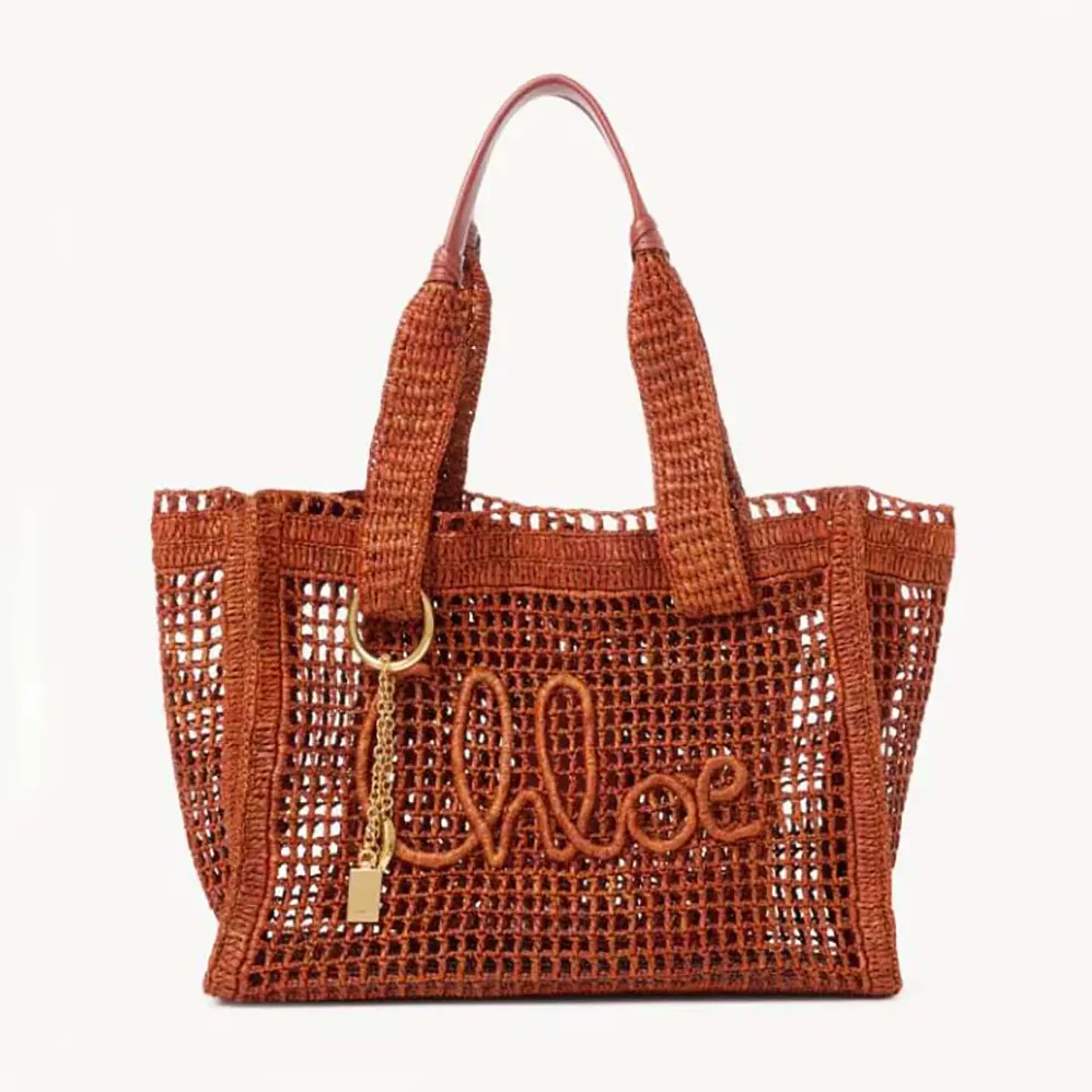 Chloe Summer Banana East-west Tote Bag in Raffia & Buffalo Leather for Women Chloe Summer Banana East-west Tote Bag in Raffia & Buffalo Leather for Women