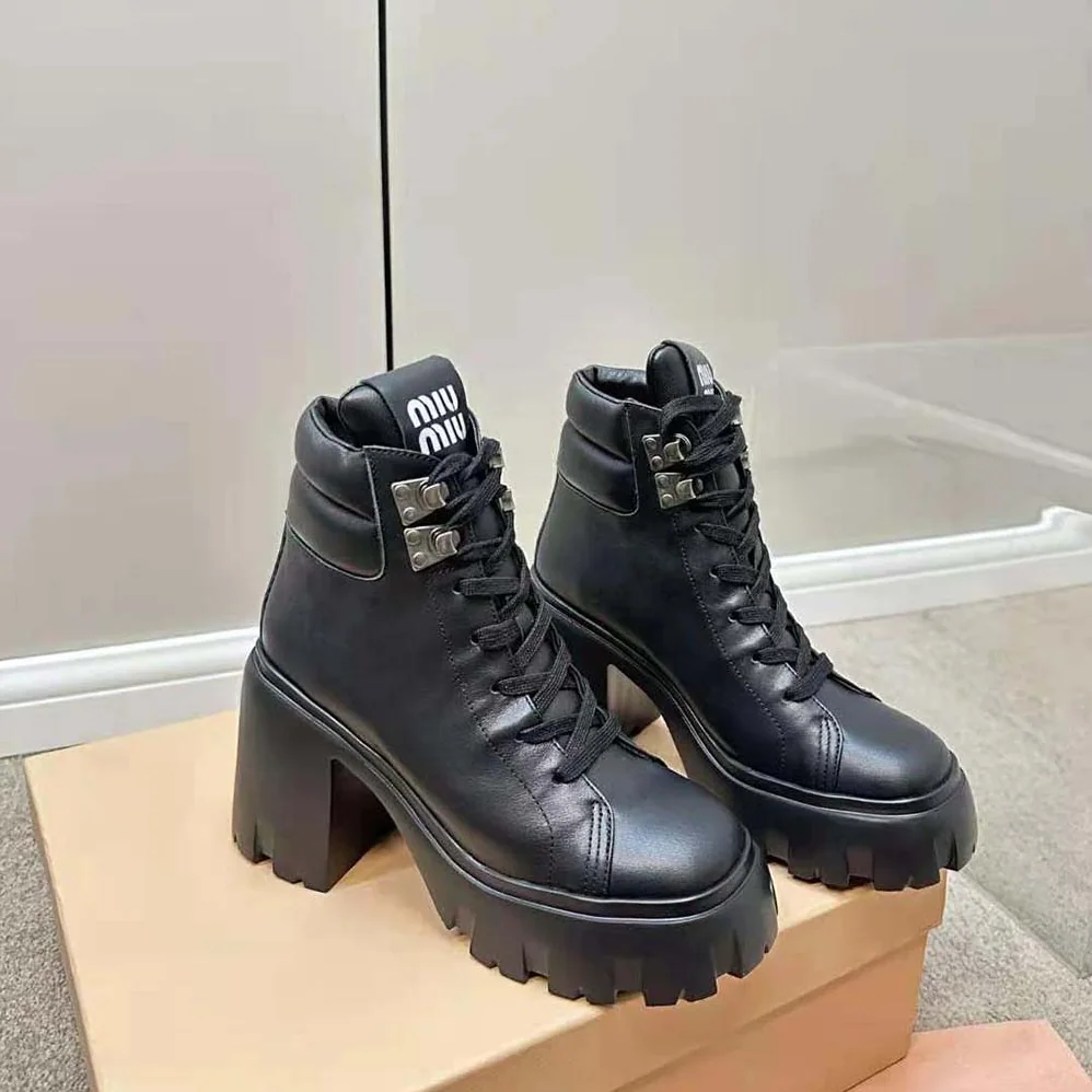 Miu Miu Leather Booties with EVA Sole with Logo for Women in Black Miu Miu Leather Booties with EVA Sole with Logo for Women in Black