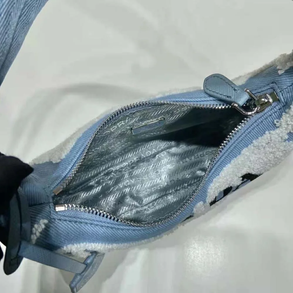 Prada Re-Edition 2000 Embroidered Drill Mini Bag for Women in Blue