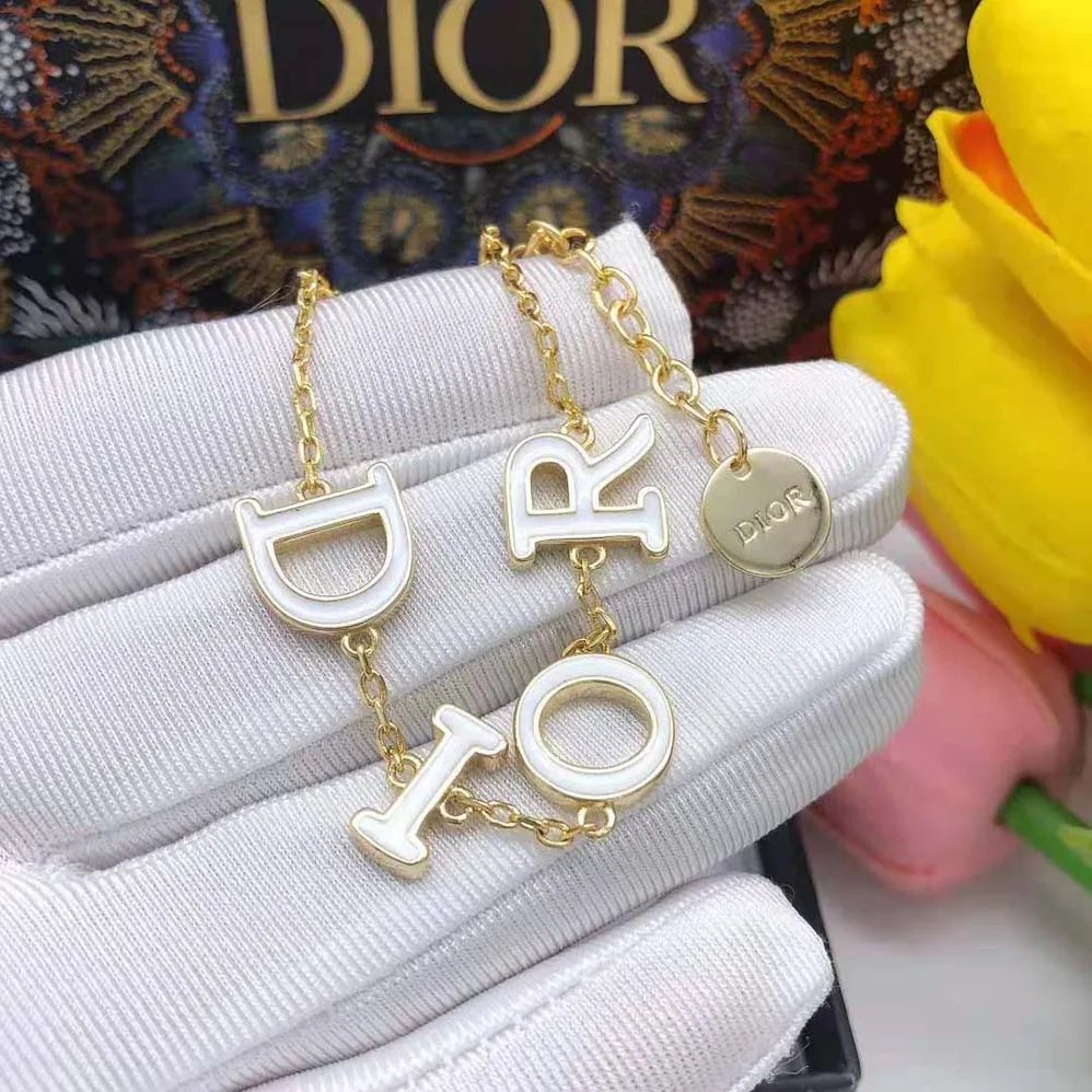 Dior Dio(r)evolution Bracelet Gold-Finish Metal and White Lacquer for Women Dior Dio(r)evolution Bracelet Gold-Finish Metal and White Lacquer for Women