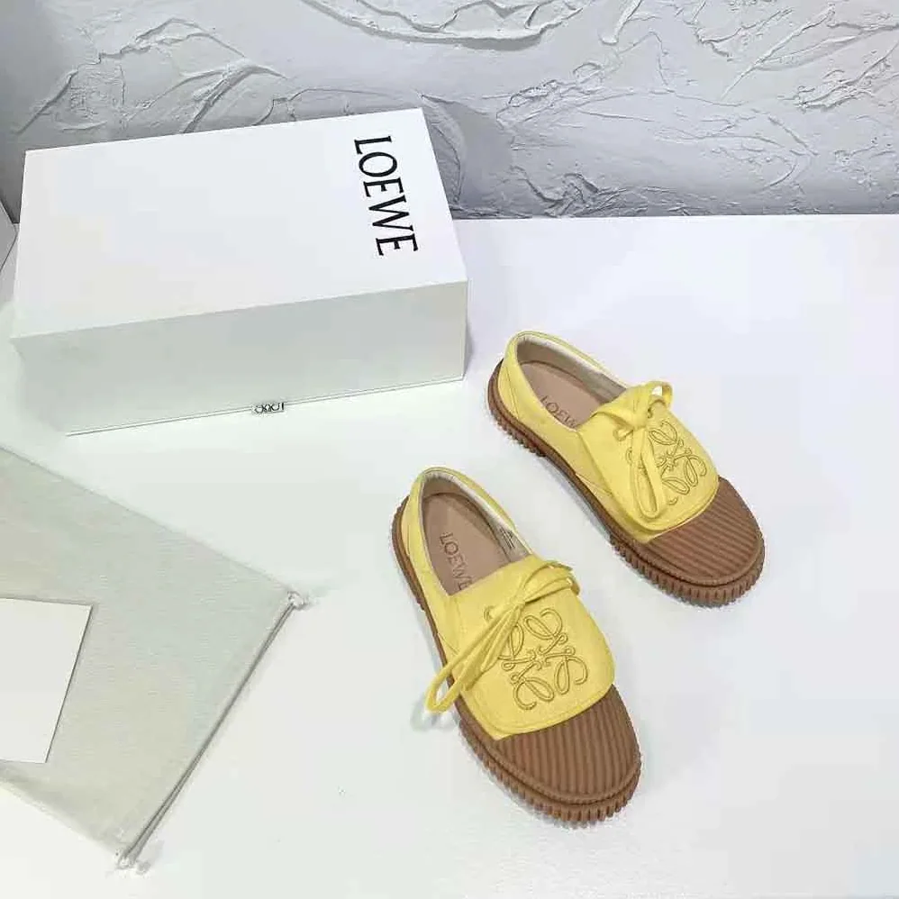 Loewe Anagram Flap Sneaker in Canvas for Women in Yellow Loewe Anagram Flap Sneaker in Canvas for Women in Yellow