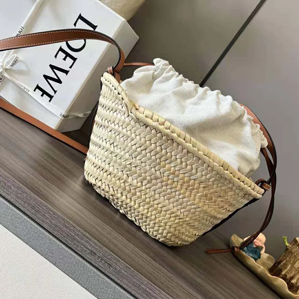 Loewe Drawstring Bucket Bag in Palm Leaf and Calfskin for Women in Brown Loewe Drawstring Bucket Bag in Palm Leaf and Calfskin for Women in Brown