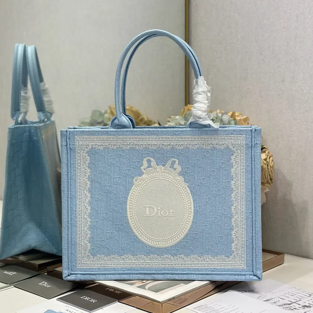Dior Medium Dior Book Tote with Strap Blue Dior Oblique Embroidery with White Lace and Dior Médaillon for Women Dior Medium Dior Book Tote with Strap Blue Dior Oblique Embroidery with White Lace and Dior Médaillon for Women