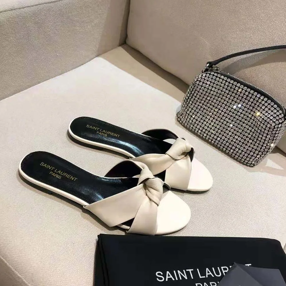 Saint Laurent YSL Bianca Flat Mules in Smooth Leather for Women in White Saint Laurent YSL Bianca Flat Mules in Smooth Leather for Women in White