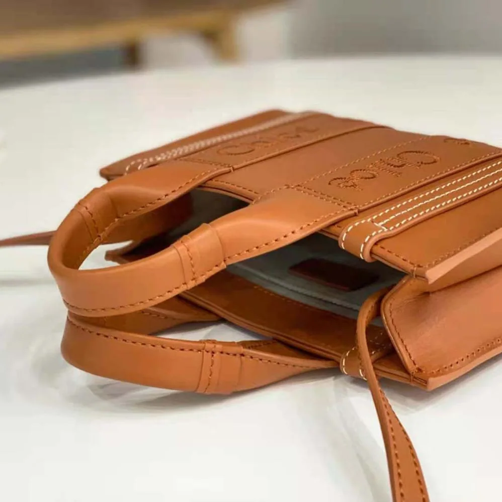 Chloe Mini Woody Tote Bag with Embroidered Chloé Logo for Women in Brown Chloe Mini Woody Tote Bag with Embroidered Chloé Logo for Women in Brown