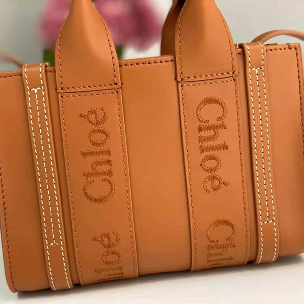 Chloe Mini Woody Tote Bag with Embroidered Chloé Logo for Women in Brown Chloe Mini Woody Tote Bag with Embroidered Chloé Logo for Women in Brown