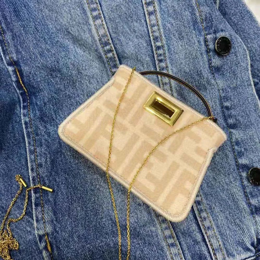 Fendi Nano Peekaboo Charm Beige Wool Charm for Women in Pink Fendi Nano Peekaboo Charm Beige Wool Charm for Women in Pink