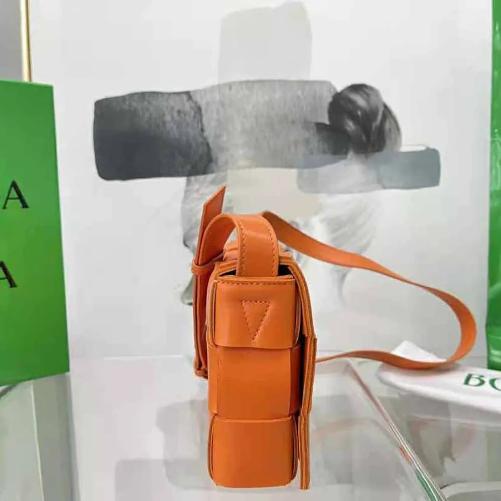 Bottega Veneta Cassette Intreccio Leather Cross-Body Bag for Women in Orange Bottega Veneta Cassette Intreccio Leather Cross-Body Bag for Women in Orange