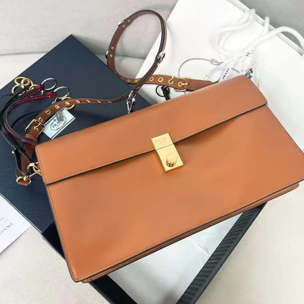 Prada Soft Sound Large Leather Shoulder Bag with Charms for Women in Brown