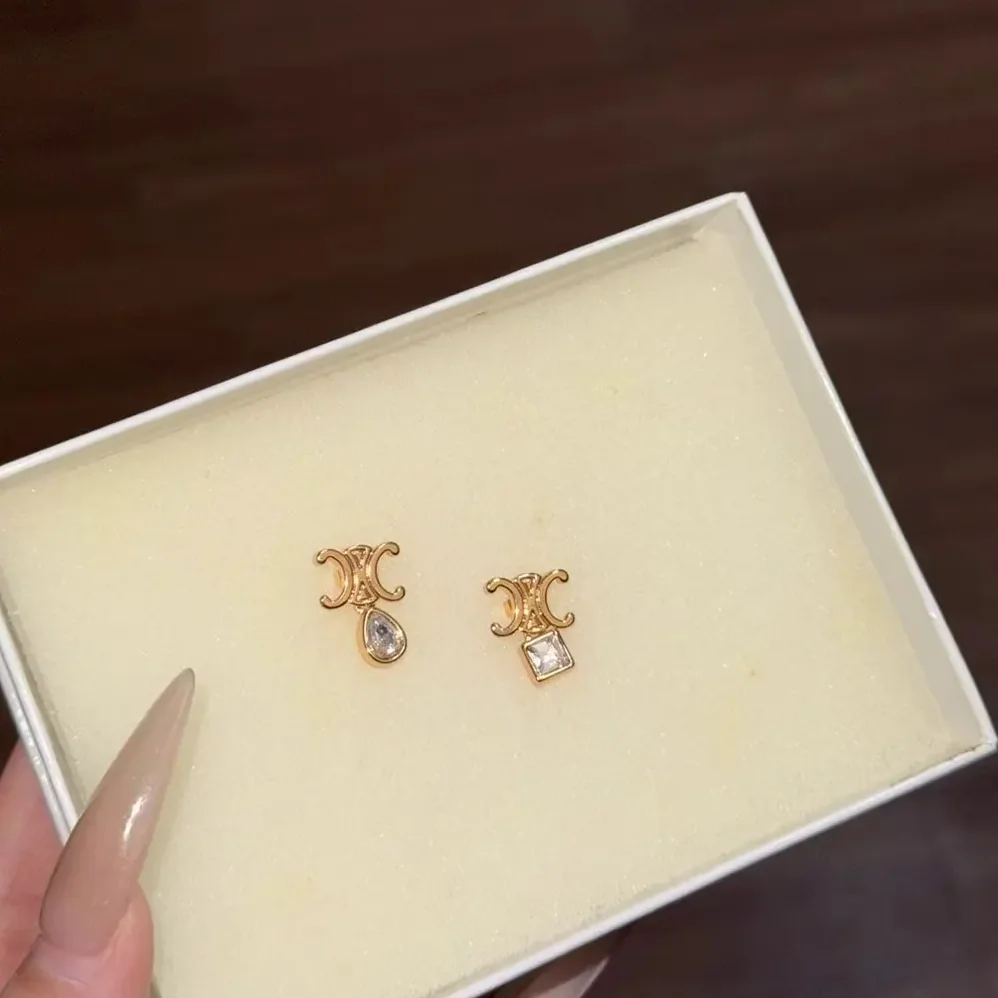 Celine Triomphe Twinkle Earrings in Strass and Brass with Gold Finish for Women