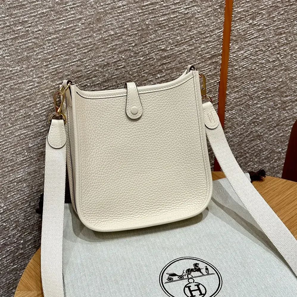 Hermes Evelyne 16 Amazone in Clemence Leather for Women in White/Gold Hermes Evelyne 16 Amazone in Clemence Leather for Women in White/Gold
