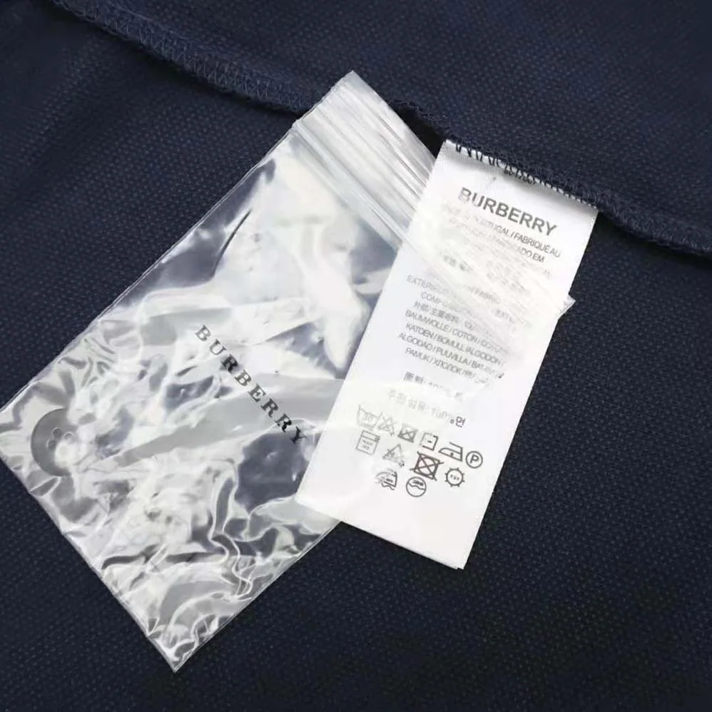 Burberry Icon Stripe Placket Cotton Piqué Polo Shirt for Men in Navy Burberry Icon Stripe Placket Cotton Piqué Polo Shirt for Men in Navy