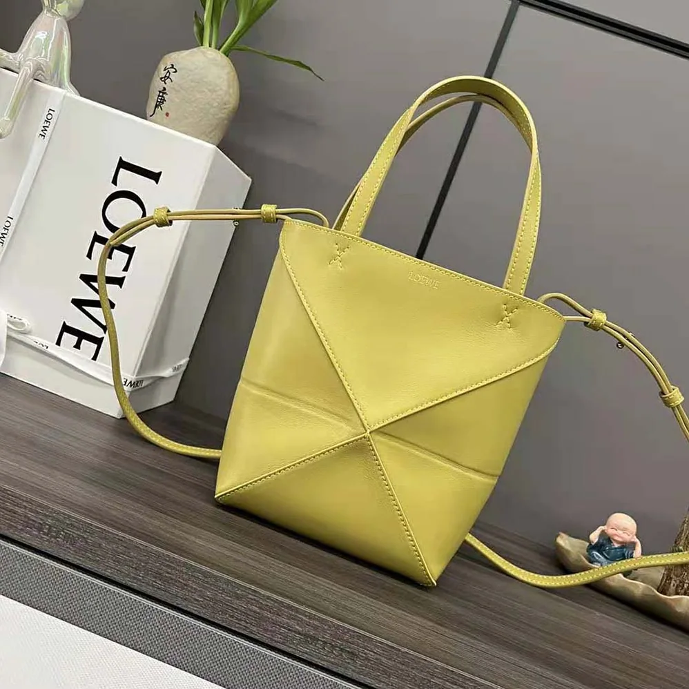 Loewe Mini Puzzle Fold Tote in Shiny Calfskin for Unisex in Yellow Loewe Mini Puzzle Fold Tote in Shiny Calfskin for Unisex in Yellow