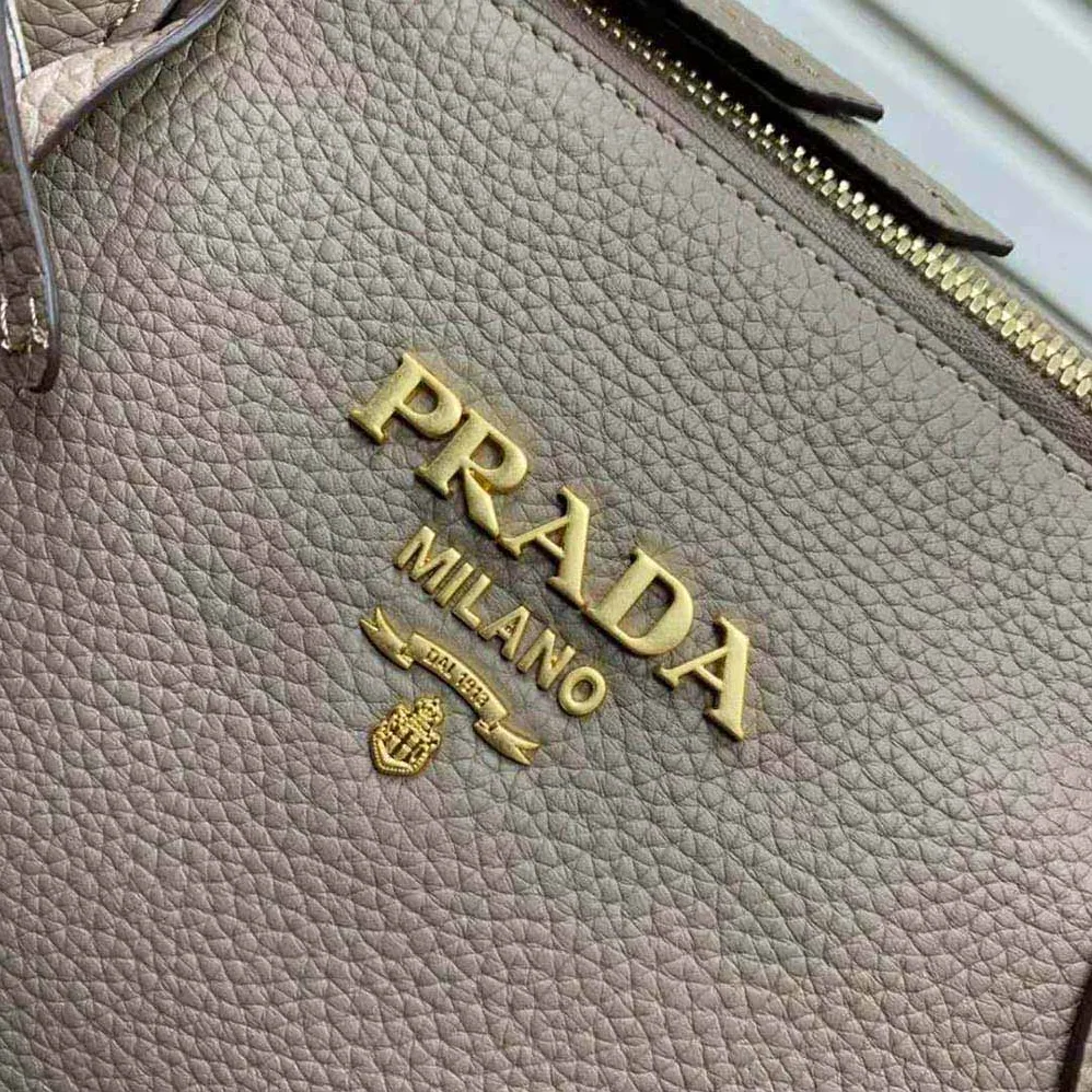 Prada Leather Handbag with Metal lettering Logo on the Front for Women in Beige Prada Leather Handbag with Metal lettering Logo on the Front for Women in Beige