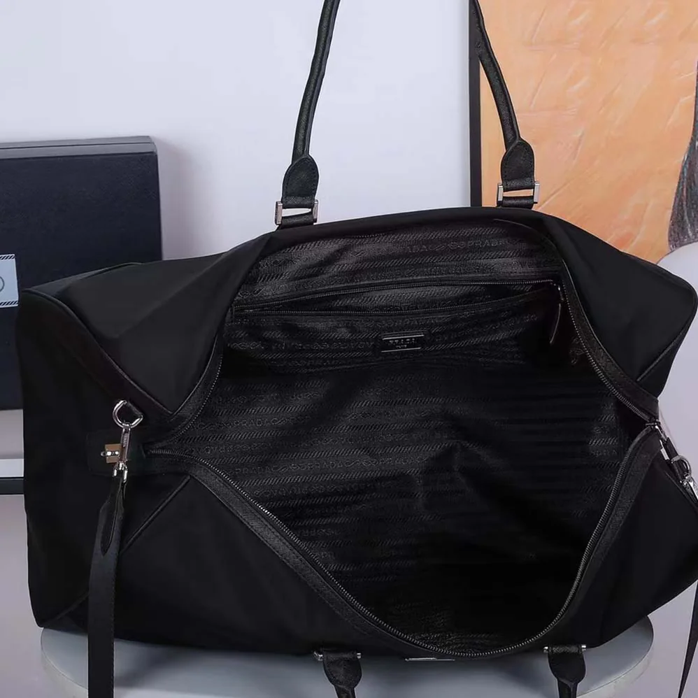 Prada Re-Nylon and Saffiano Leather Duffle Bag for Men in Black