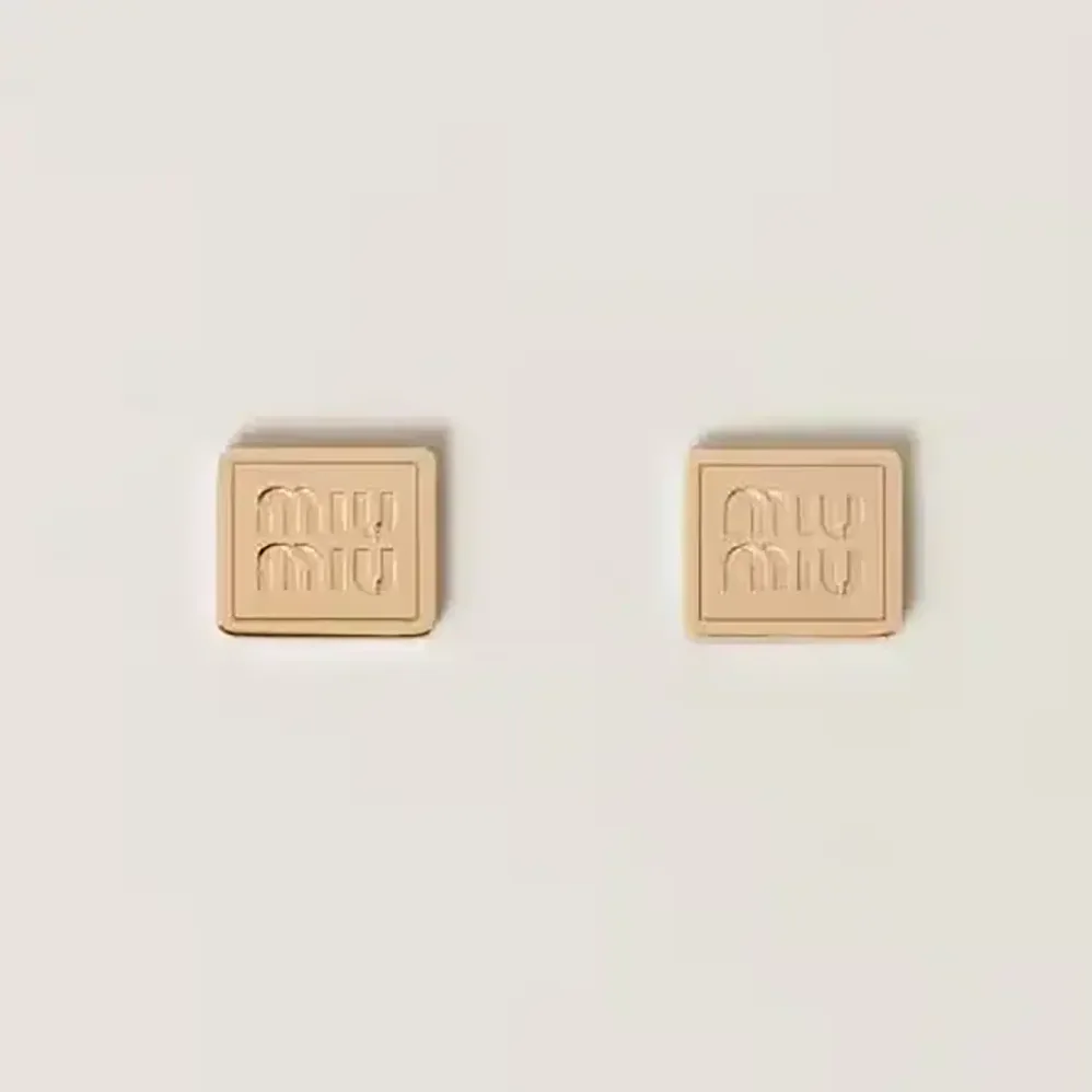 Miu Miu Metal Earrings with Visible Perforated Logo for Women Miu Miu Metal Earrings with Visible Perforated Logo for Women