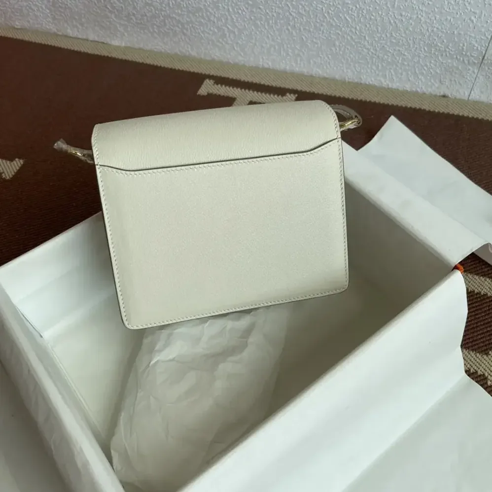 Hermes Roulis Mini Bag in Evercolor Calfskin for Women in White/Gold Hermes Roulis Mini Bag in Evercolor Calfskin for Women in White/Gold