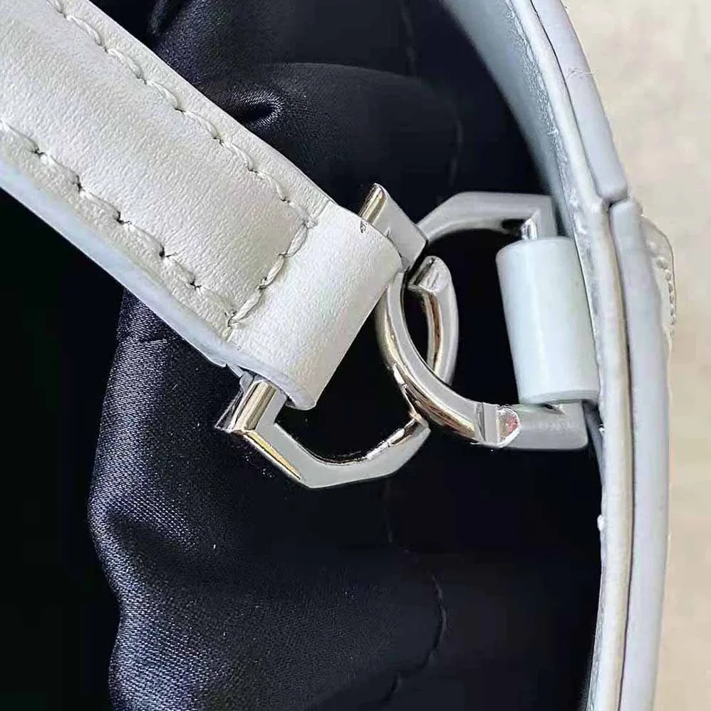 Givenchy Mini Cut Out Bucket Bag in Box Leather for Women in White Givenchy Mini Cut Out Bucket Bag in Box Leather for Women in White