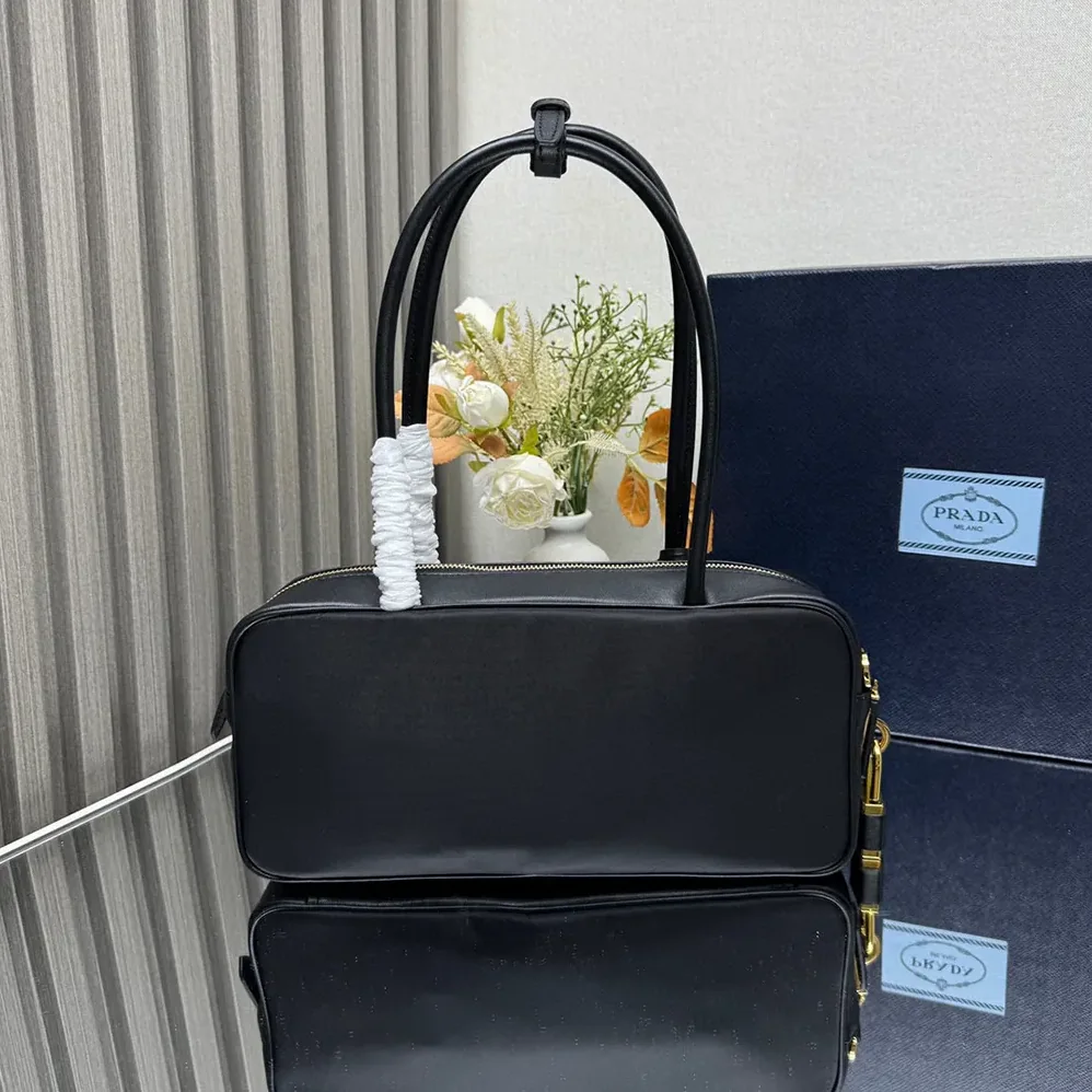 Prada Re-Nylon and Leather Small Top for Women in handle Bag with Padlock Prada Re-Nylon and Leather Small Top for Women in handle Bag with Padlock