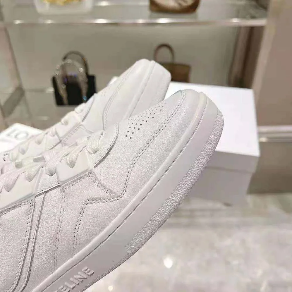 Celine Trainer Low Lace-up Sneaker in Calfskin for Women in White Celine Trainer Low Lace-up Sneaker in Calfskin for Women in White
