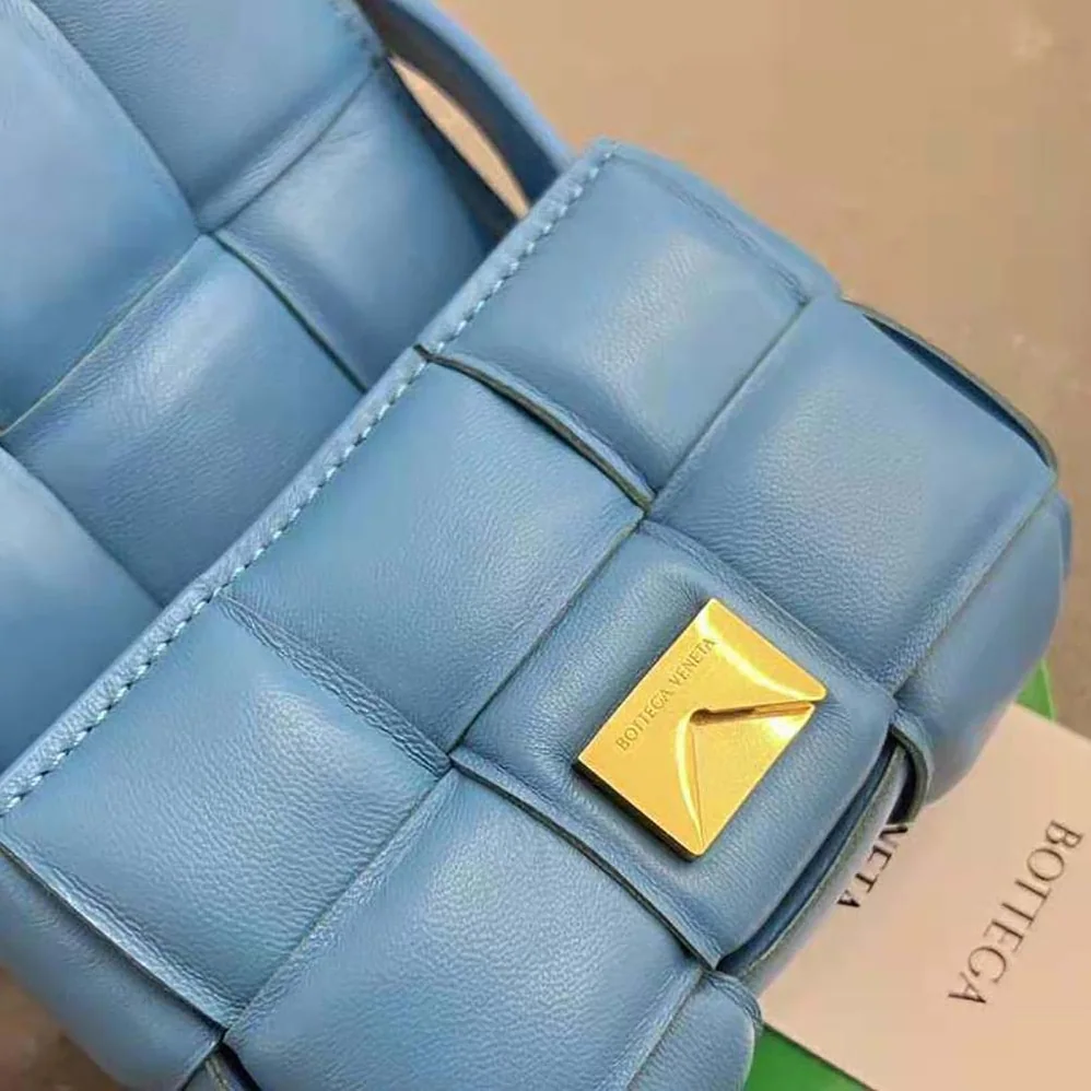 Bottega Veneta Candy Padded Cassette Mini Padded Intreccio Leather Cross-Body Bag for Women in Blue Bottega Veneta Candy Padded Cassette Mini Padded Intreccio Leather Cross-Body Bag for Women in Blue