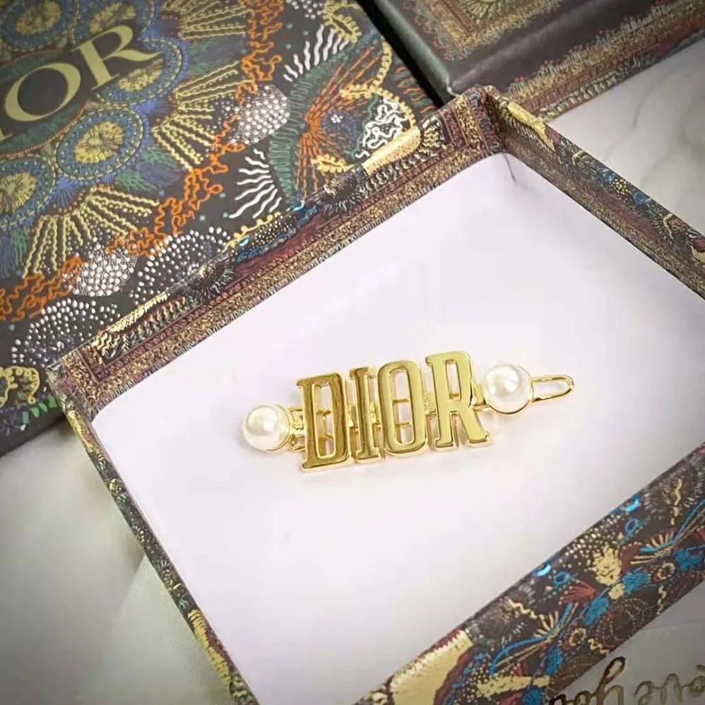 Dior Dio(r)evolution Barrette Gold-Finish Metal and White Resin Pearls for Women Dior Dio(r)evolution Barrette Gold-Finish Metal and White Resin Pearls for Women