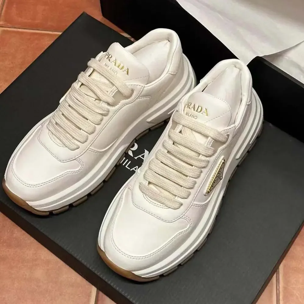 Prada Triangle Logo Leather Sneakers for Unisex in White