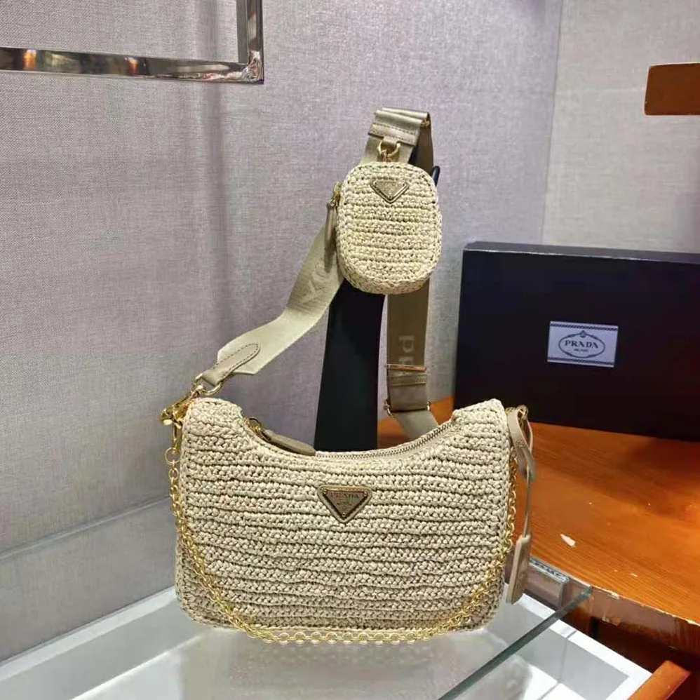 Prada Re-Edition 2005 Raffia Bag for Women in Natural Prada Re-Edition 2005 Raffia Bag for Women in Natural