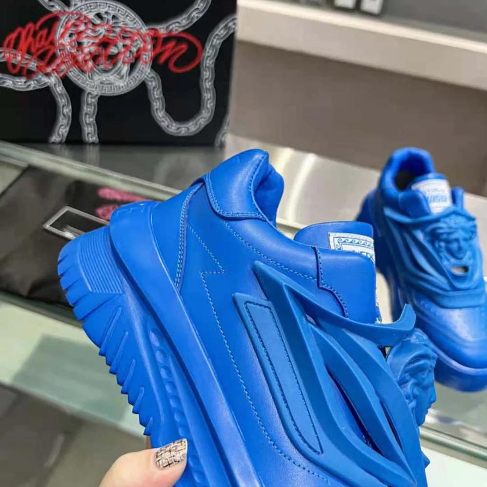 Versace Odissea Sneakers are Set on Rubber Soles with Perforated Toe Caps for Unisex in Blue Versace Odissea Sneakers are Set on Rubber Soles with Perforated Toe Caps for Unisex in Blue