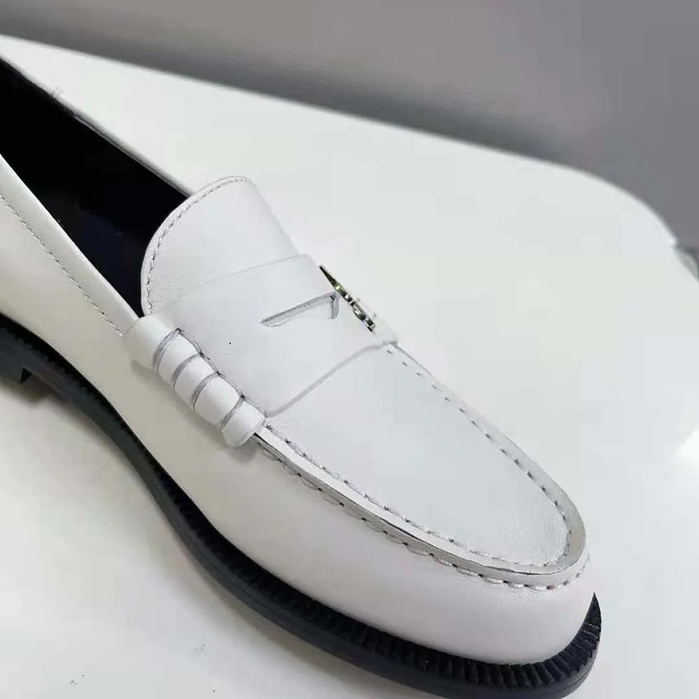 Celine Le Loafer Penny Slippers in Smooth Leather for Women in White Celine Le Loafer Penny Slippers in Smooth Leather for Women in White