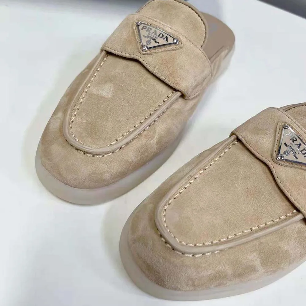 Prada Suede Leather Sabots with Enameled Metal Triangle Logo for Unisex in Brown