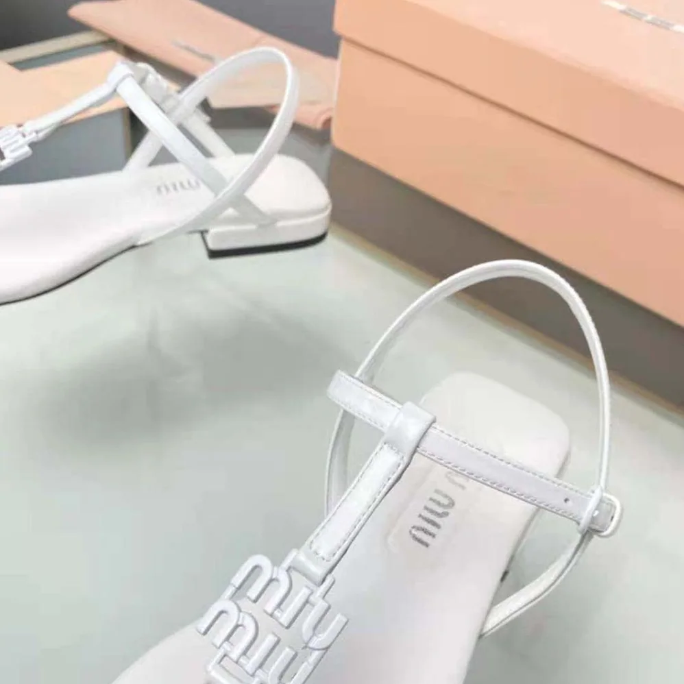 Miu Miu Patent Thong Sandals with Metal Lettering Logo for Women in White Miu Miu Patent Thong Sandals with Metal Lettering Logo for Women in White
