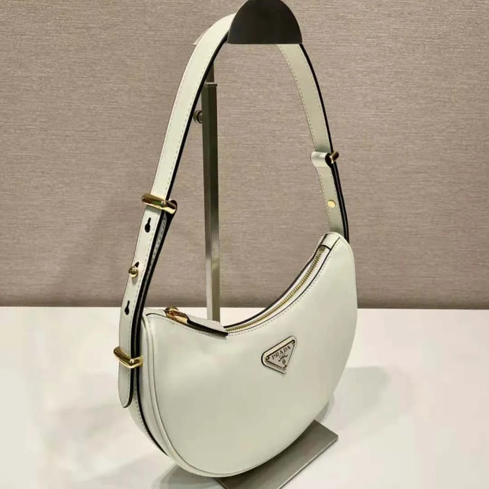 Prada Leather Shoulder Bag with Enameled Metal Triangle Logo for Women in White