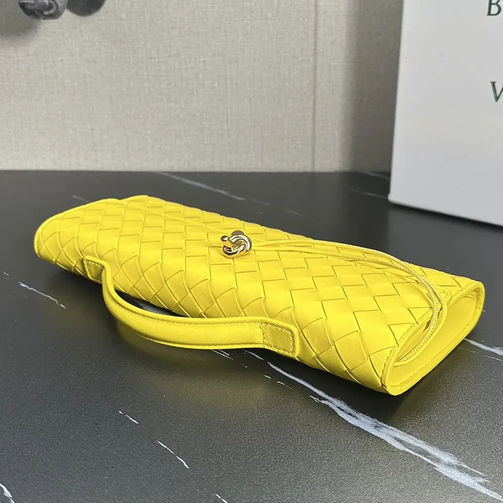 Bottega Veneta Andiamo Clutch in Intrecciato Leather for Women in Yellow Bottega Veneta Andiamo Clutch in Intrecciato Leather for Women in Yellow