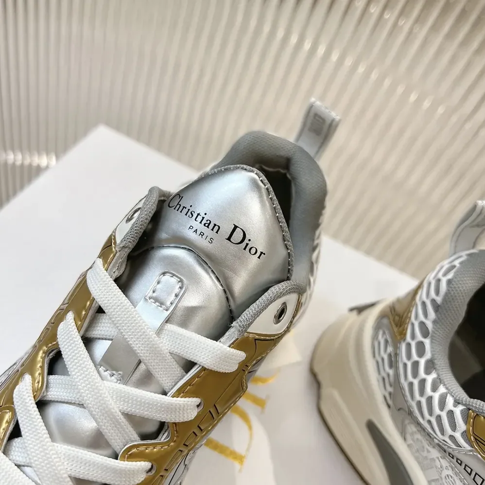 Dior Vibe Sneaker White Mesh Printed with Dior Oblique Motif and Gold- and Silver in Tone Dior Vibe Sneaker White Mesh Printed with Dior Oblique Motif and Gold- and Silver in Tone